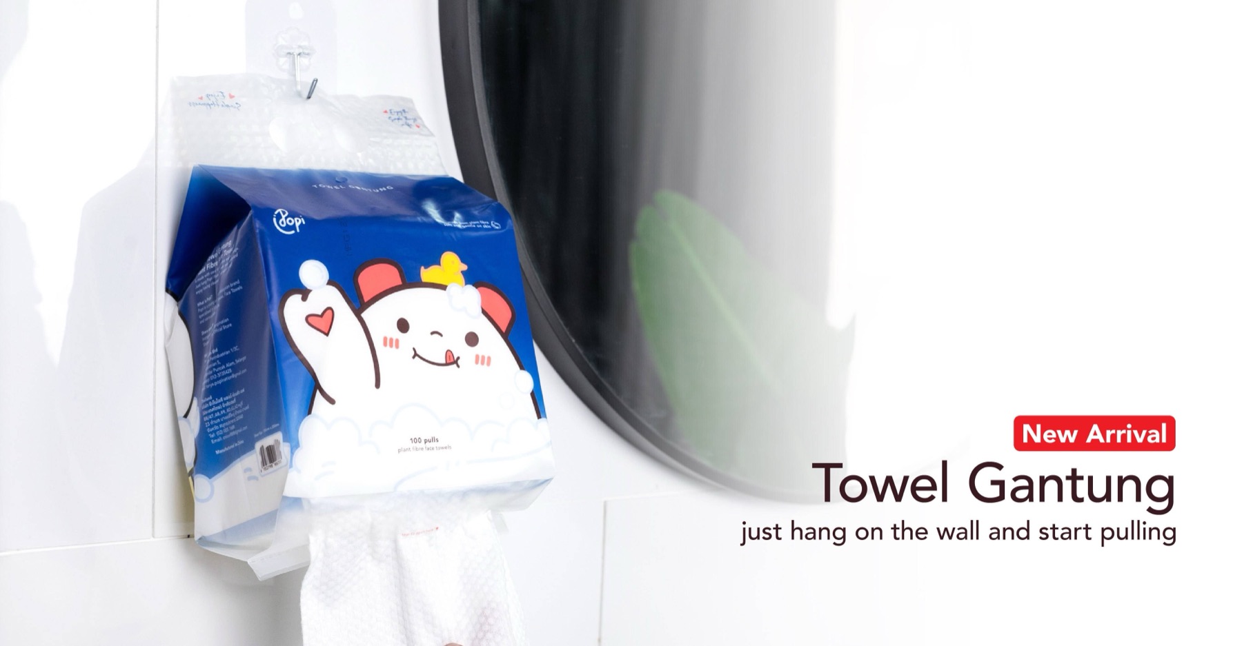 Popi Towel Gantung face towels hanging on a bathroom wall